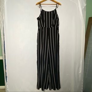 Urban outfitters jumpsuit, black w/white stripes.  Size L